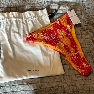 Kotomi bikini bottoms.  NWT. Orange and red.